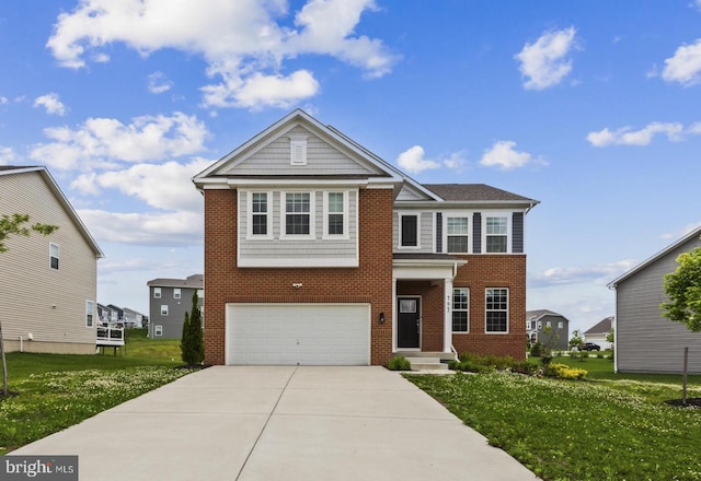 view of front of house featuring brick siding, driveway, a front yard, and an attached garage