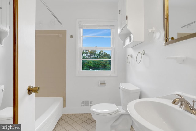 1501 Stirling Ct, Fort Washington, MD 20744 - bathroom with toilet, a sink, and tile patterned floors