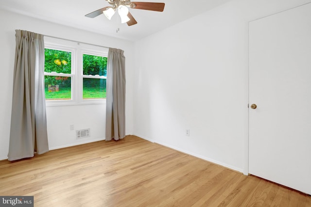 1501 Stirling Ct, Fort Washington, MD 20744 - empty room with a ceiling fan, light wood finished floors, and baseboards