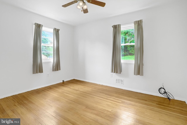1501 Stirling Ct, Fort Washington, MD 20744 - spare room with plenty of natural light, light wood-style flooring, ceiling fan, and baseboards