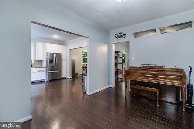 10560 S Faulkner Rd, Faulkner, MD 20632 - dining room with baseboards, dark wood-style floors, and ornamental molding
