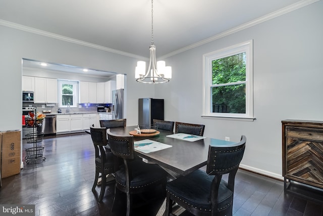 10560 S Faulkner Rd, Faulkner, MD 20632 - dining room with dark wood finished floors, a chandelier, ornamental molding, and baseboards