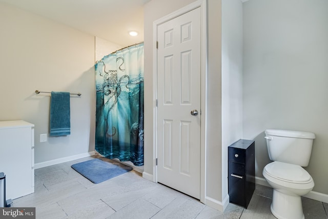 10560 S Faulkner Rd, Faulkner, MD 20632 - bathroom with toilet, baseboards, and a shower with curtain