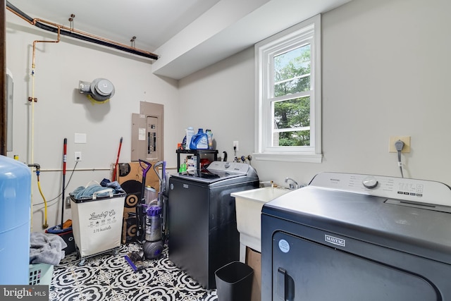 10560 S Faulkner Rd, Faulkner, MD 20632 - washroom with electric panel and independent washer and dryer