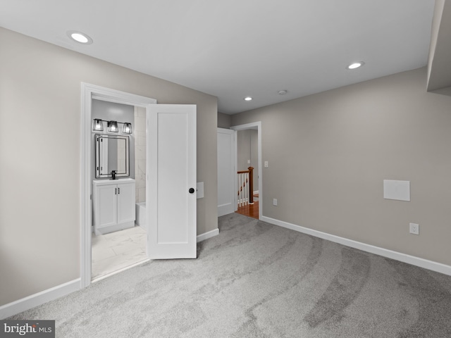519 23rd Pl NE, Washington, DC 20002 - unfurnished bedroom featuring baseboards, recessed lighting, carpet floors, and connected bathroom