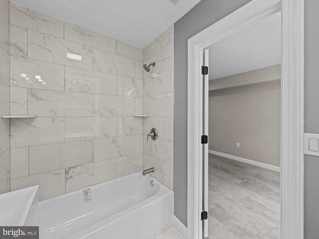 519 23rd Pl NE, Washington, DC 20002 - bathroom with bathtub / shower combination and baseboards