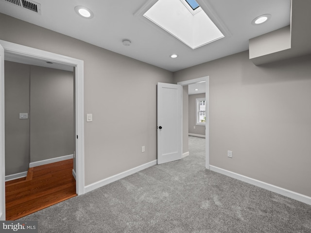 519 23rd Pl NE, Washington, DC 20002 - unfurnished bedroom featuring a skylight, carpet, baseboards, and recessed lighting