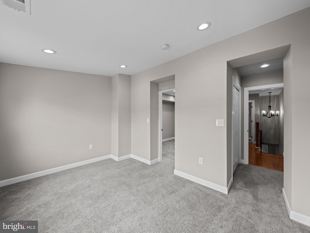 519 23rd Pl NE, Washington, DC 20002 - spare room with recessed lighting, carpet, baseboards, and a chandelier