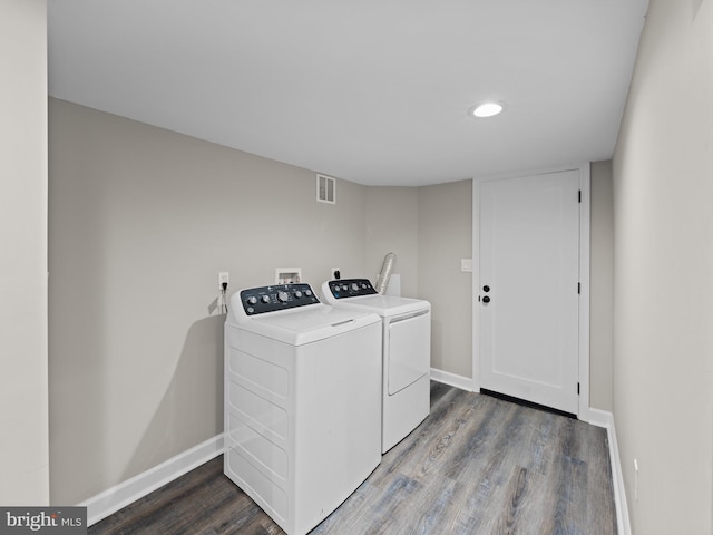 519 23rd Pl NE, Washington, DC 20002 - washroom with washing machine and clothes dryer, wood finished floors, baseboards, and recessed lighting