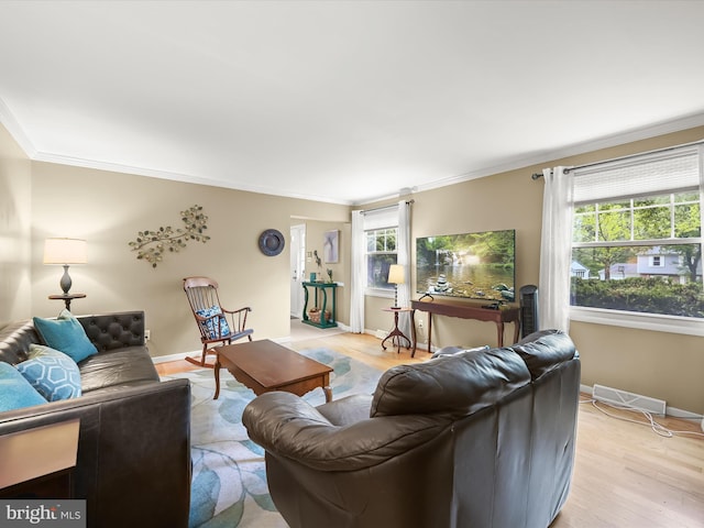 5264 Open Window, Columbia, MD 21044 - living room featuring healthy amount of natural light, crown molding, and light wood finished floors