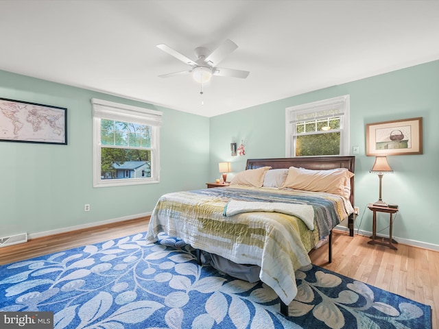 5264 Open Window, Columbia, MD 21044 - bedroom with wood finished floors, multiple windows, and a ceiling fan
