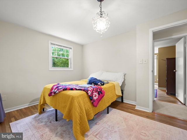 5264 Open Window, Columbia, MD 21044 - bedroom with wood finished floors and a chandelier