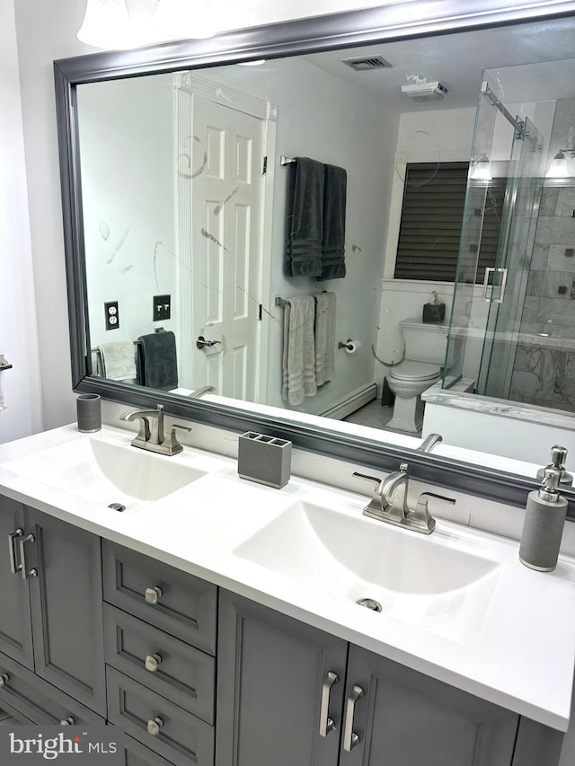19 Center St, Barnegat, NJ 08005 - full bathroom with double vanity, toilet, and a stall shower