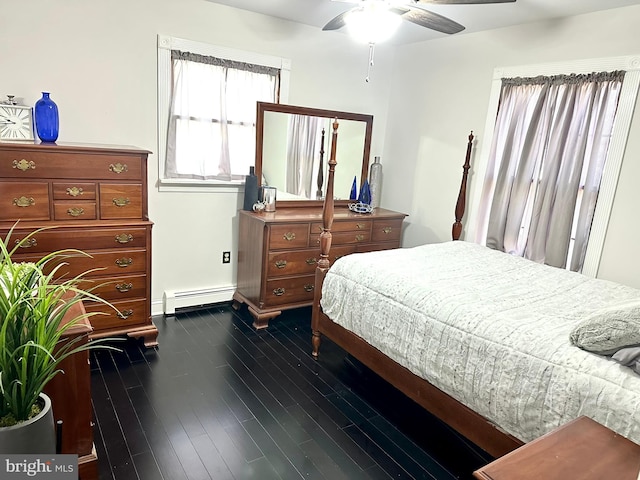 19 Center St, Barnegat, NJ 08005 - bedroom with a baseboard heating unit, dark wood-style floors, and a ceiling fan