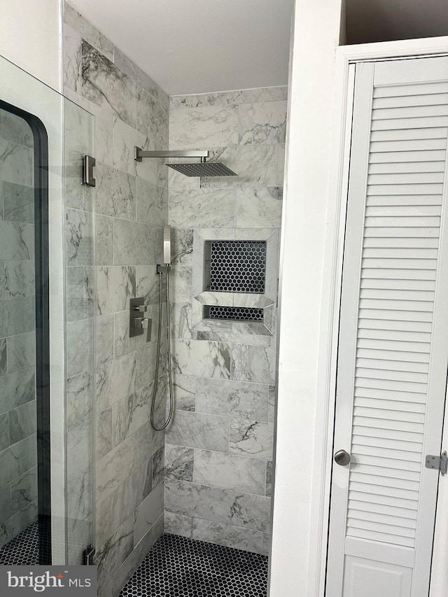 19 Center St, Barnegat, NJ 08005 - bathroom featuring a shower stall and a closet
