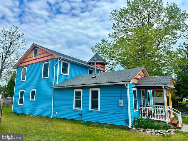 19 Center St, Barnegat, NJ 08005 - back of house featuring a porch and roof with shingles