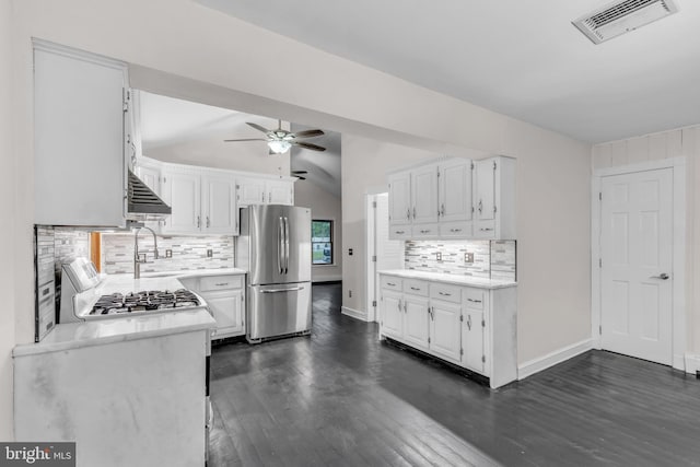 19 Center St, Barnegat, NJ 08005 - kitchen featuring freestanding refrigerator, light countertops, ceiling fan, tasteful backsplash, and dark wood-style floors