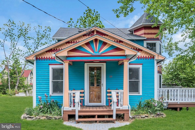 19 Center St, Barnegat, NJ 08005 - victorian home featuring a front lawn