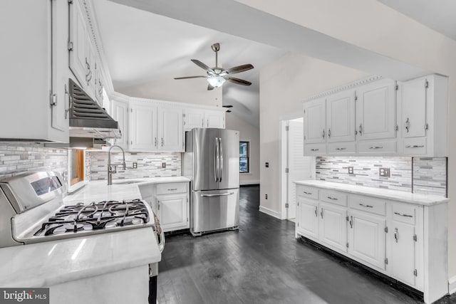 19 Center St, Barnegat, NJ 08005 - kitchen featuring freestanding refrigerator, a sink, under cabinet range hood, range with gas stovetop, and ceiling fan