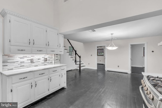19 Center St, Barnegat, NJ 08005 - kitchen featuring white cabinets, tasteful backsplash, and light countertops