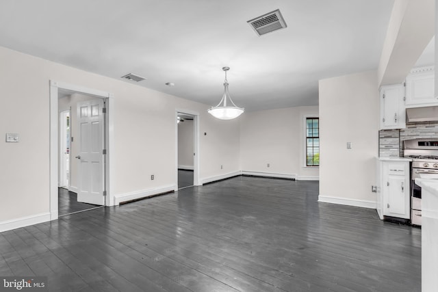 19 Center St, Barnegat, NJ 08005 - unfurnished living room featuring dark wood-style floors and baseboards