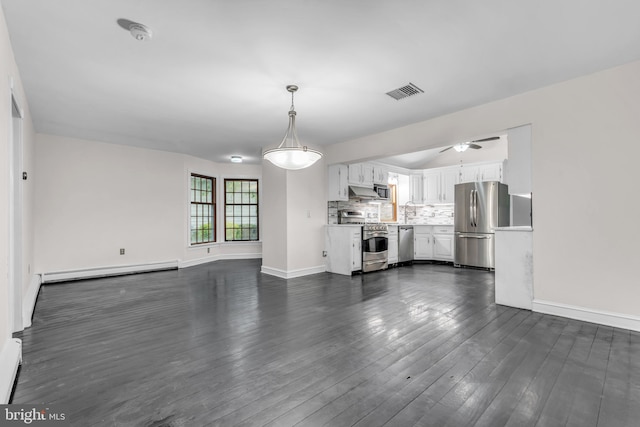 19 Center St, Barnegat, NJ 08005 - unfurnished living room featuring baseboards, dark wood-type flooring, a baseboard radiator, and ceiling fan