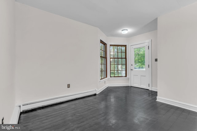 19 Center St, Barnegat, NJ 08005 - unfurnished room featuring baseboards, baseboard heating, and dark wood finished floors