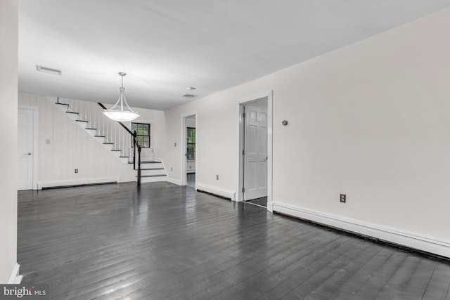 19 Center St, Barnegat, NJ 08005 - unfurnished living room with stairs, a baseboard heating unit, dark wood-type flooring, and baseboards