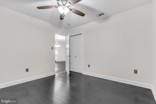19 Center St, Barnegat, NJ 08005 - unfurnished room with a ceiling fan, baseboards, and dark wood-style flooring