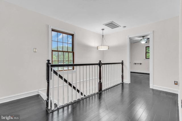 19 Center St, Barnegat, NJ 08005 - hallway with an upstairs landing, dark wood-style floors, and healthy amount of natural light