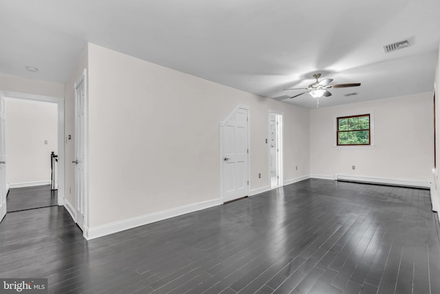 19 Center St, Barnegat, NJ 08005 - unfurnished living room featuring a ceiling fan, a baseboard heating unit, dark wood finished floors, and baseboards