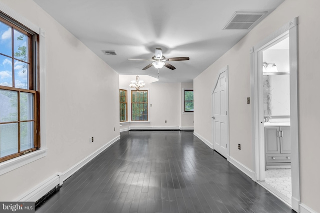 19 Center St, Barnegat, NJ 08005 - unfurnished room with a chandelier, a ceiling fan, dark wood-style floors, and baseboards