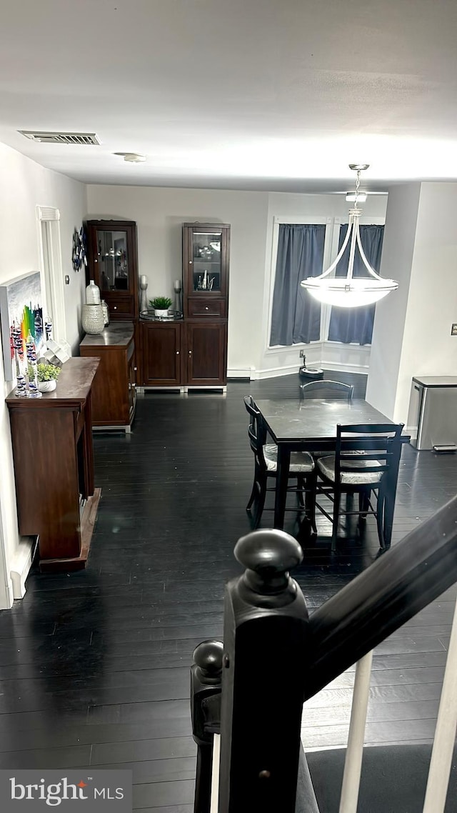 19 Center St, Barnegat, NJ 08005 - dining area with dark wood-type flooring