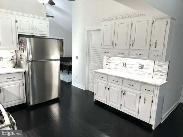 19 Center St, Barnegat, NJ 08005 - kitchen featuring freestanding refrigerator, backsplash, ceiling fan, white cabinets, and lofted ceiling