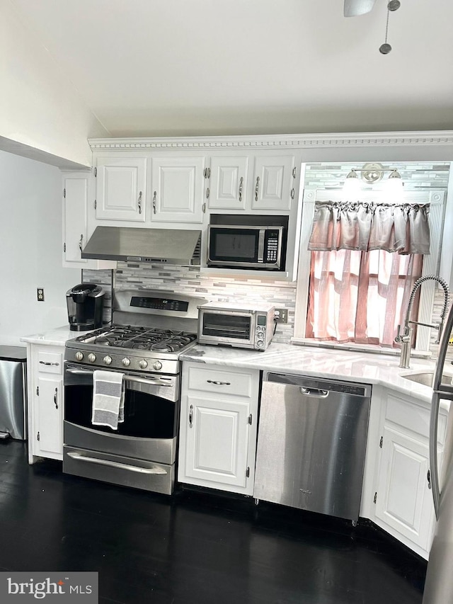 19 Center St, Barnegat, NJ 08005 - kitchen featuring appliances with stainless steel finishes, under cabinet range hood, and white cabinets