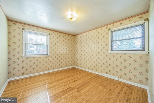 835 Wayside Ln, Haddonfield, NJ 08033 - empty room with light wood-type flooring, crown molding, baseboards, and wallpapered walls
