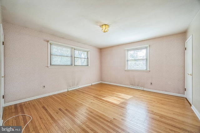 835 Wayside Ln, Haddonfield, NJ 08033 - empty room featuring wood-type flooring, healthy amount of natural light, and baseboards
