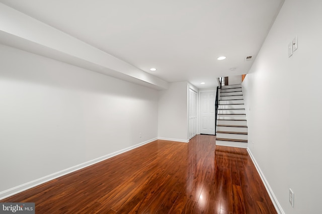 214 S Madeira St S, Baltimore, MD 21231 - finished basement with recessed lighting, wood finished floors, baseboards, and stairs