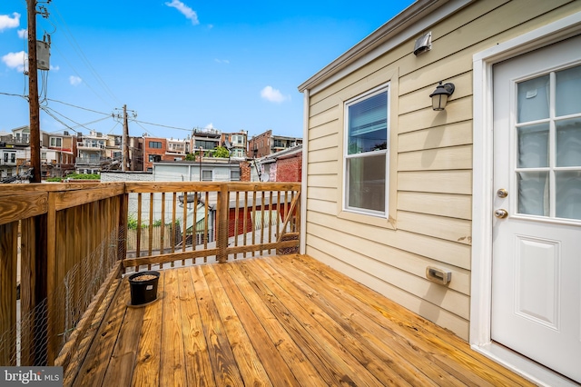 214 S Madeira St S, Baltimore, MD 21231 - wooden deck featuring a residential view
