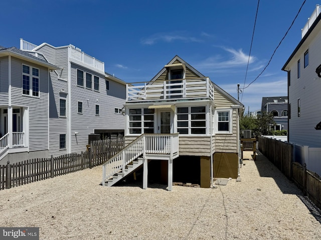 215 W 23rd St, Ship Bottom, NJ 08008 - rear view of house featuring a fenced backyard