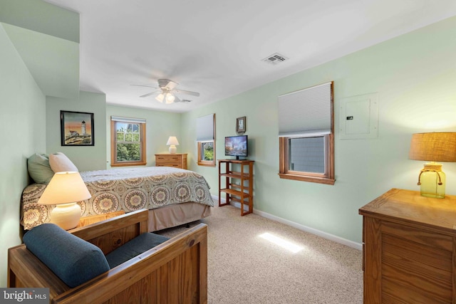 215 W 23rd St, Ship Bottom, NJ 08008 - bedroom with carpet flooring, baseboards, electric panel, and a ceiling fan