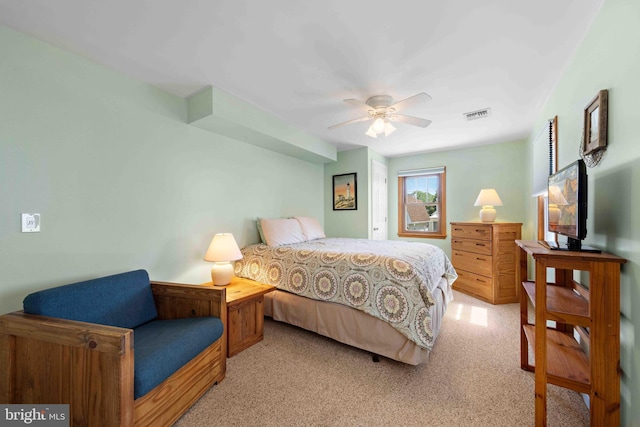 215 W 23rd St, Ship Bottom, NJ 08008 - bedroom featuring light colored carpet and a ceiling fan