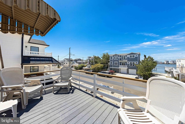 215 W 23rd St, Ship Bottom, NJ 08008 - wooden terrace featuring a residential view