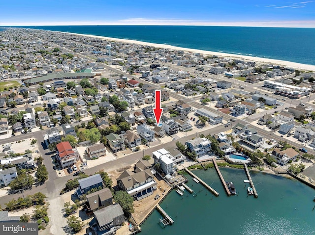 215 W 23rd St, Ship Bottom, NJ 08008 - aerial view of property's location featuring waterfront with a beach and nearby suburban area
