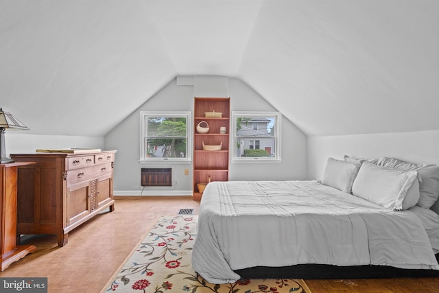 1011 Woodcliffe Ave, Media, PA 19063 - bedroom with lofted ceiling, light wood-style flooring, and baseboards