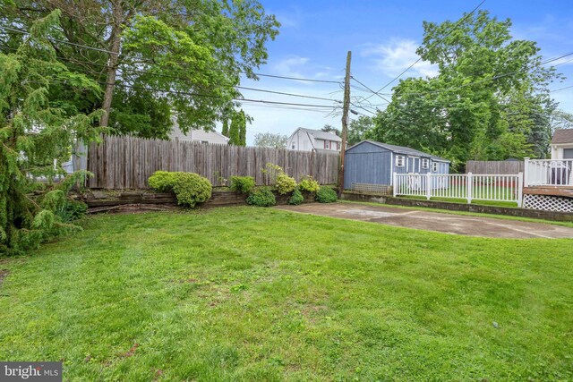 1011 Woodcliffe Ave, Media, PA 19063 - view of yard featuring an outdoor structure, a patio, and a wooden deck