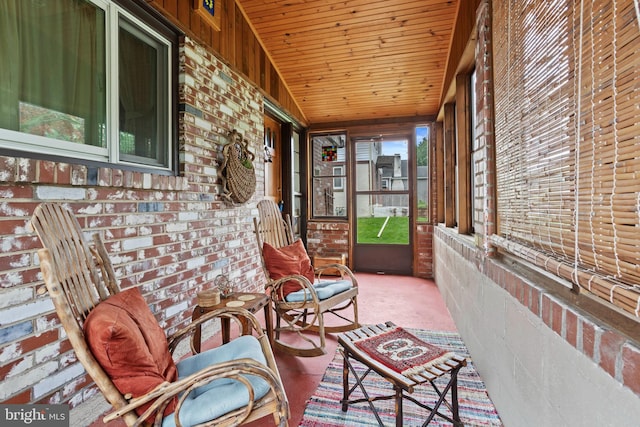 1011 Woodcliffe Ave, Media, PA 19063 - sunroom / solarium featuring carpet, wooden ceiling, and brick wall