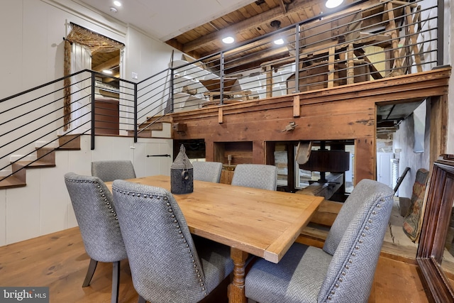 1700 N Texter Mountain Rd, Reinholds, PA 17569 - dining space featuring stairs, wooden ceiling with exposed beams, wood walls, and wood finished floors