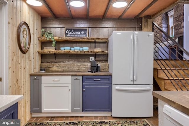 1700 N Texter Mountain Rd, Reinholds, PA 17569 - bar area featuring white appliances, wooden walls, and stairs