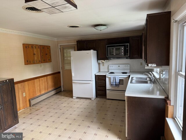 402 W Summit St, Mohnton, PA 19540 - kitchen featuring white appliances, a sink, baseboard heating, light countertops, and light flooring